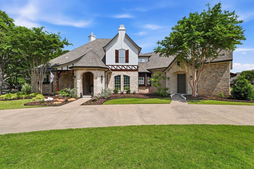 Experience the perfect blend of indoor luxury and outdoor adventure! This stunning Argyle property sits on over an acre of land, featuring a wide-open floorplan designed for hosting family and friends.  This is the perfect mix of indoor elegance and comfort and outdoor peace.  The heart of the home is the large, open living area, where floor-to-ceiling glass overlooks a massive, shaded backyard and a resort-style pool and spa. With the primary and two guest rooms on the first floor, this layout offers the ultimate flexibility for modern living.  The 1st floor BR facing backyard makes a perfect WFH office. The 2nd floor offers 2 bedrooms, a gameroom and hidden media room.  You'll enjoy the circle driveway and a separate residence driveway to a 3-car garage. The Backyard is amazing for summer BBQs by the fire pit, and having fun in the park-like setting.  All this along with highly-rated Argyle ISD schools and easy access to nearby shopping and great restaurants,