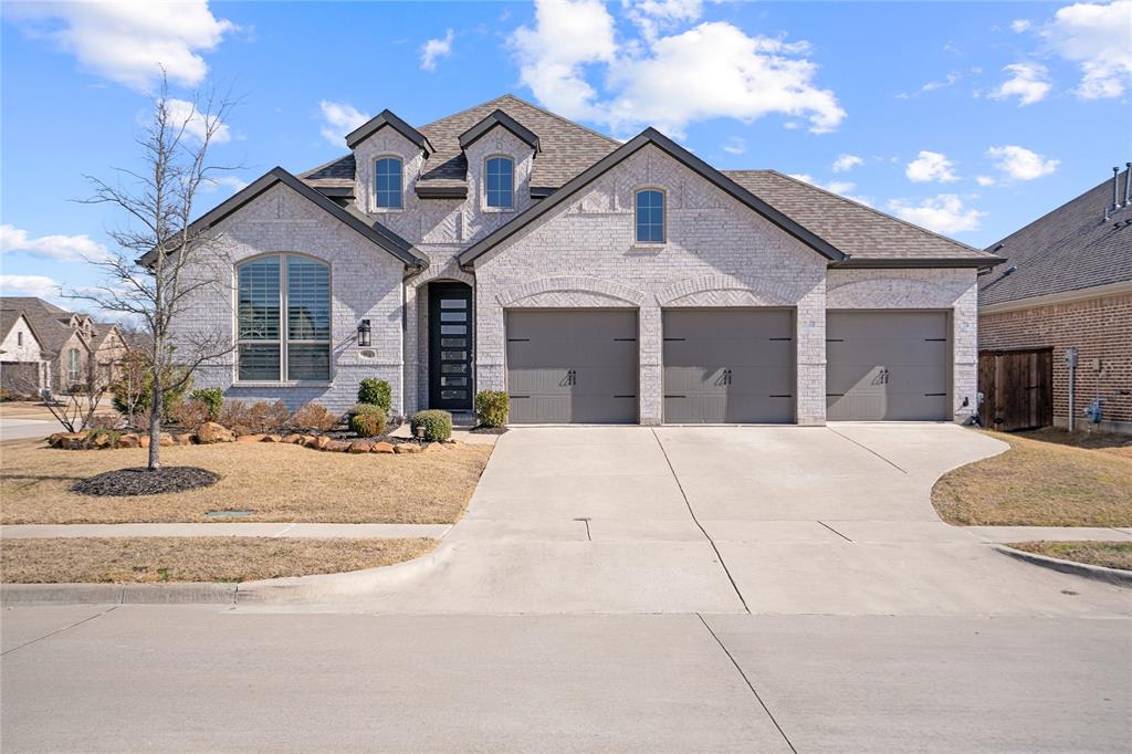 This stunning one-story home blends luxury design with everyday comfort, offering three bedrooms, two and a half baths, a private office, and a thoughtfully arranged open floor plan ideal for modern living. Exceptional curb appeal features elegant white brick, a custom front door, architectural uplighting, and an impressive three-car garage.

Inside, expansive living spaces include a welcoming family room with a cozy fireplace and a dedicated media room perfect for movie nights or entertaining. The beautifully designed kitchen anchors the heart of the home with quartz countertops, a generous center island, designer backsplash, and under-cabinet lighting that adds both function and ambiance. Open sight lines seamlessly connect the kitchen to the living and dining areas, creating an ideal space for gatherings.

The extended primary suite offers a true retreat, complete with a luxurious en suite bath featuring a drop-in soaking tub, separate shower, dual vanities, and a spacious walk-in closet. Positioned for privacy, the primary bedroom is also set apart from the secondary bedrooms.

Finally, step outside to an extended outdoor living area with a covered patio overlooking the fenced backyard—perfect for relaxing or entertaining year-round. Located in the highly sought-after Trinity Falls community, residents enjoy access to community amenities, scenic surroundings, events, and convenient proximity to shopping, dining, and schools. Schedule your private showing today!