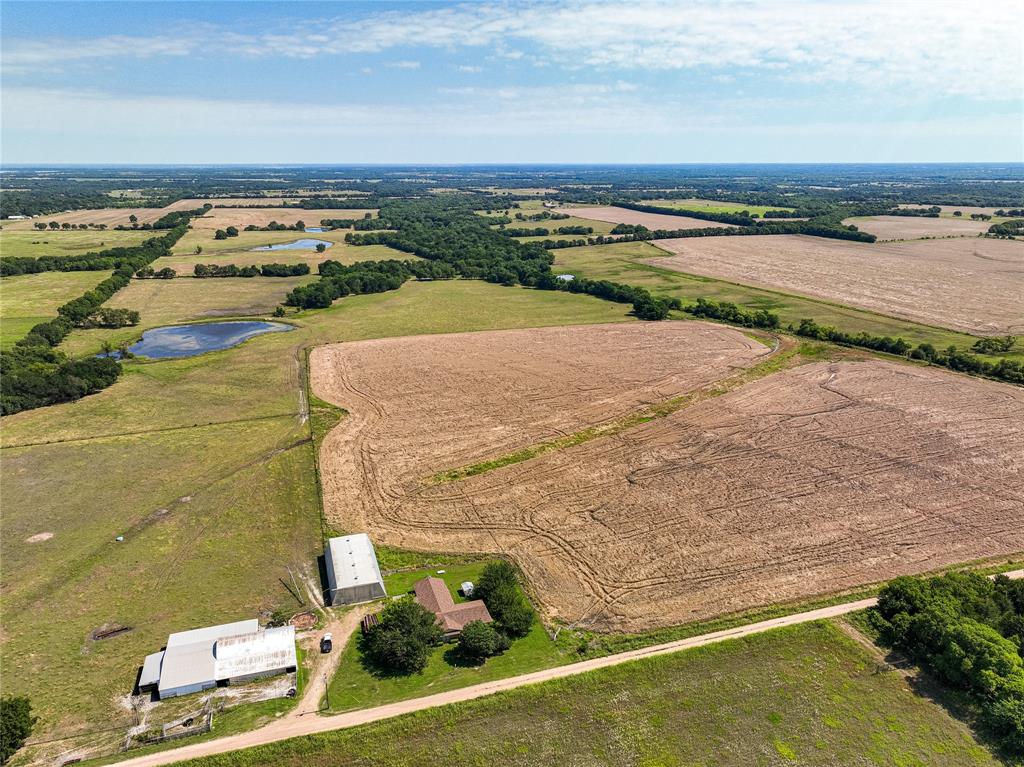 508.47 acres with a great mix of pasture land, wooded areas and productive farmland is located southwest of Bonham in fast growing Fannin County. This property has approximately 8700 feet of road frontage on three sides and no floodplain, making it a great choice for development or future development. Located only 5.5 miles off State HWY 121 and and 3.75 miles to US HWY 82 provides for a quick commutes to the McKinney-Frisco area as well as the Sherman-Denison area. The subject property lies about 8 miles west-southwest of already growing Bonham which is poised for continued rapid growth as State HWY 121 expands to a divided 4 lane highway in the near future.
