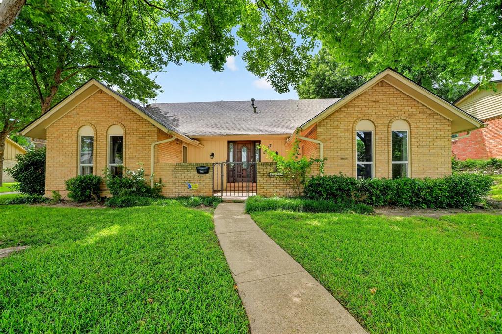 BACK ON MARKET! Priced to go FAST, book tours and offers ASAP. 


Set among the rolling hills and mature trees of Oak Park Estates, this distinctive two-story home blends timeless character with generous living spaces and a welcoming architectural presence. A private courtyard entry and classic iron detailing create a memorable first impression, while the home’s spacious layout offers comfort, flexibility, and enduring appeal.

Inside, an open staircase with decorative iron railings serves as a striking focal point. The expansive family room is anchored by a beautiful brick fireplace with an arched opening and oversized hearth, creating a warm and inviting atmosphere for everyday living and entertaining alike. Natural light fills the interior, complementing the home’s well-proportioned rooms and functional floorplan.

The first-floor primary suite provides convenience and privacy, while three additional upstairs bedrooms each include walk-in closets, with one offering access to a private balcony. Multiple living and dining areas provide versatility for gatherings, work-from-home needs, or quiet retreat spaces.

Additional highlights include updated windows, a recently replaced roof, a rear-entry two-car garage, and a separate two-car carport for added flexibility and storage. The fenced backyard offers ample outdoor space surrounded by the beauty of this established neighborhood.

Oak Park Estates is known for its gently varied topography, beautiful tree canopy, and proximity to the Five Mile Creek greenbelt, Kiestwood Trail, Kiest Park, and Oak Cliff Nature Preserve. Convenient access to Highway 67, I-35, and Loop 12 makes commuting across the metroplex simple while preserving the peaceful feel of the neighborhood.

A home full of character, warmth, and space in one of Oak Cliff’s most established communities.