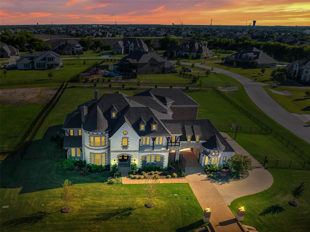 Distinctive design elements throughout this elegant home catch your eye from the moment you step inside and continue throughout. Exceptional details create welcoming spaces such as the sunken wine room, tucked away private study, a cozy music room or the shared home work space. All bedrooms offer en-suite baths, walk in closets and complete privacy with the ultimate split floor plan. The Owner's retreat is nothing less than dreamy, with pool access and views, a spa-like bath and beautiful lighting. Sneak away to the state of the art theater room for movie night or master your cooking skills in the enormous chef's kitchen. Perfect for entertaining both indoors or out with an amazing pool and 1.25 acre lot. This one has it all and then some!