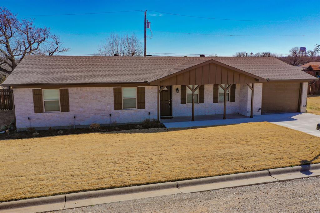 Welcome to 128 Oak Creek Blvd, nestled in a quiet, well-established neighborhood in Jacksboro. This beautifully updated three (or four) bedroom, one and one-half bath brick home offers comfort, style, and modern upgrades throughout — all at an incredible value of $242,500.

Step inside to discover a fresh, inviting interior featuring new windows, new interior doors, updated light fixtures, and a new dishwasher. The kitchen and bathrooms shine with elegant granite countertops, blending timeless style with everyday functionality.

Outside, the improvements continue with new rain gutters, new driveway and a new back patio with awning — perfect for relaxing or entertaining — and a new privacy fence that creates your own peaceful backyard retreat.

This home offers the perfect balance of charm and modern convenience in a serene setting. Whether you’re looking for your first home, downsizing, or investing, this move-in-ready property checks all the boxes.