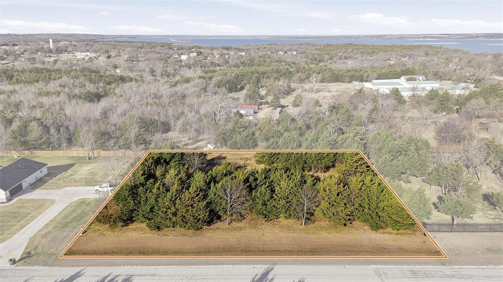 Build your dream home on this beautiful 1-acre lot at 497 Brandon Way, just minutes from the shores of Lake Texoma. This spacious homesite offers the perfect blend of privacy and accessibility, giving you room to breathe while still being close to boating, fishing, and all the recreation the lake lifestyle offers.  With ample space for a custom home, shop, pool, or outdoor living area, this property provides flexibility to create exactly what you envision. Enjoy peaceful surroundings, wide-open skies, and the freedom that comes with owning a full acre near one of North Texas’ most sought-after destinations.  Whether you’re planning a weekend retreat or a full-time residence, this location puts you near marinas, restaurants, and outdoor adventure while still offering a quiet place to call home.  Opportunities this close to Lake Texoma on a full acre are limited. Secure your slice of Texoma and start building the life you’ve been dreaming about.