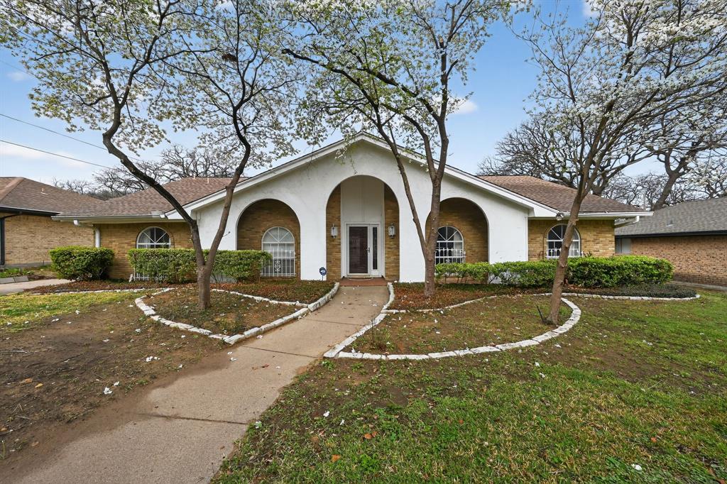 This beautifully maintained 3-bedroom, 2-bath home offers 2,419 square feet of comfortable living space in the desirable Castle Oaks Addition. Inside, you’ll find a distinctive curved fireplace that creates a warm and inviting focal point in the living area. The home sits on a charming lot highlighted by three beautiful dogwood trees in the front yard, adding standout curb appeal and seasonal color. Located in a quiet, established neighborhood, the property is also just about 5 miles from the Arlington Entertainment District, giving you quick access to dining, shopping, sports, and entertainment while still enjoying a peaceful residential setting.