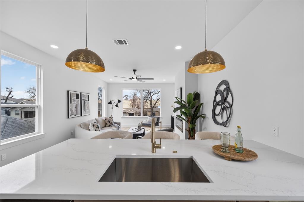 Offering up to $20,000 in lender credit toward a rate buy down when using the preferred lender, plus additional buyer incentives available. Contact listing agent for details.

Experience modern living in this beautifully designed three-story new construction featuring 4 bedrooms, 3.5 baths, and approximately 1,940 SF of thoughtfully curated space.

The open concept main level is filled with natural light and showcases a contemporary kitchen with ceiling height cabinetry, sleek finishes, and an ideal layout for entertaining.

The spacious primary suite offers a walkin closet and spainspired bath with dual vanities. A dedicated office provides flexibility for remote work, creative space, or guest accommodations. Functional design extends throughout all levels, complemented by an attached 1-car garage.

Conveniently located just minutes from Downtown Dallas, Deep Ellum, and Fair Park with quick access to I-30 and I-45, offering an ideal blend of modern style and urban convenience.