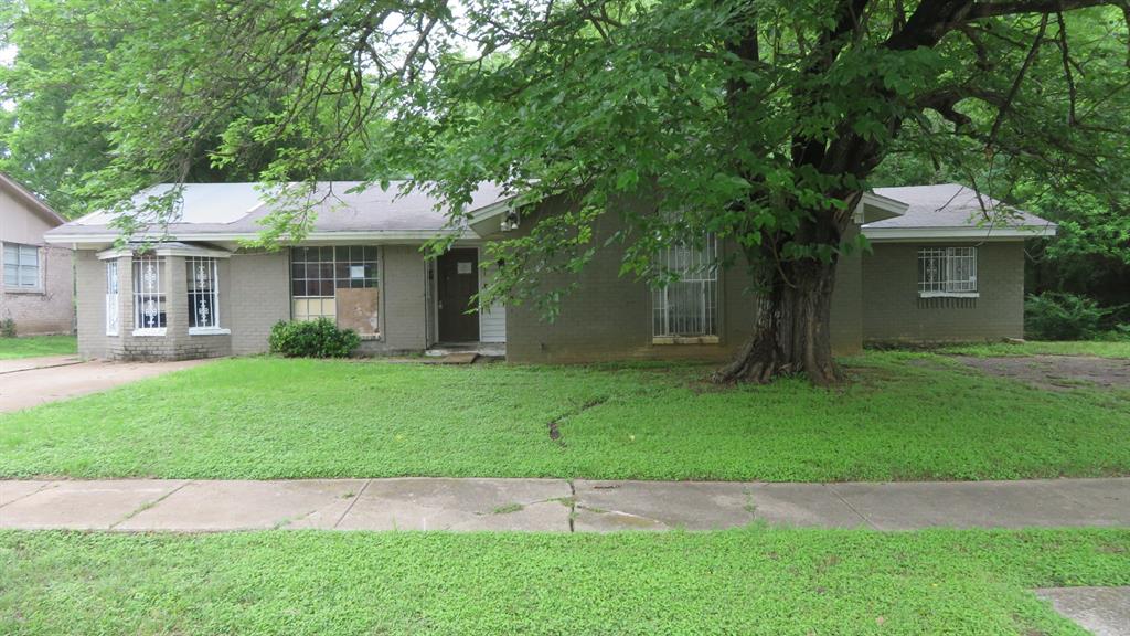 Sitting on a spacious corner lot, this hard-to-find brick home is in need of repairs but has great potential and priced to sell quickly!  Great floor plan with 4 bedrooms, 2 bathrooms offers 1,790 sq ft of living space! The home also features a good-sized backyard, ideal for weekend BBQs or relaxing evenings outdoors. Located just minutes from major freeways, this home offers easy access to everything Dallas has to offer. With some TLC this home will be ideal for a growing family. This home is being Sold AS-IS and all measurements are approximate.  Buyer's and buyer's agent to verify all information.