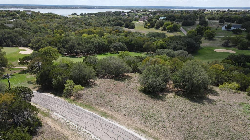 Two lots totaling over a half acre in the beautiful subdivision, White Bluff resort. 7033 & 7034 Golf Dr, These lots are located near the golf course, the 19th hole restaurant and not far from the marina the lake. Seize the opportunity to secure this site to build your dream home and enjoy all the amenities that White Bluff has to offer. The purchase of this package comes with free rounds of golf per year or a fitness center key card.