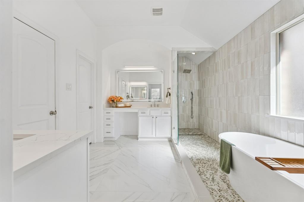 Single-story living, beautifully reimagined. Tucked into sought after Sorrellwood Park, this fully remodeled one level home blends designer finishes with true lock and leave ease, the rare pairing of style and simplicity. A 2021 renovation with more than $120,000 in upgrades shows from the moment you arrive. The open concept living area centers on a gas fireplace and flows into a stunning kitchen featuring black quartz countertops, a large center island, gold pendant lighting, and crisp cabinetry finished with on trend hardware. A walk-in pantry keeps everything beautifully organized, equally suited to quiet mornings and easy entertaining.
The private primary suite is a true retreat, with a sunlit sitting area, a spa style bath showcasing an oversized walk-in shower and dual vanities, and a custom closet system. A thoughtful split layout sets the secondary bedrooms apart for privacy, while a dedicated study makes an ideal home office, library, or hobby room.
Step outside to an oversized covered patio with a built-in grill and outdoor kitchen, overlooking a private, low-maintenance yard, designed for relaxed evenings, not weekend lawn work. Smart home features run throughout, and the oversized garage adds a side bonus bump-out, roughly 100 extra square feet ideal for storage, a workshop, or a golf cart.
The location is second to none: minutes from historic downtown McKinney and its acclaimed dining, boutiques, and year round events, with quick access to Hwy 121 and US 75 for an easy commute anywhere in the Metroplex. The community offers a greenbelt, walking and jogging trails, sidewalks, and a neighborhood park, all with a low annual HOA. Zoned to acclaimed McKinney ISD schools.
Move in ready and finished down to the last detail, this is single story living at its very best. Schedule your private showing today.