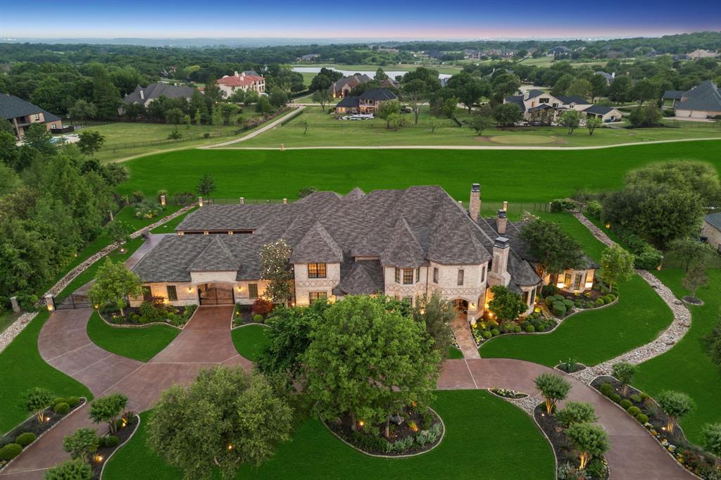 Over 8300 square feet under HVAC. Behold a true masterpiece within the coveted Guard Gated enclave of Tour 18, poised elegantly on the 8th tee. This exclusive estate spans 1.5 acres, offering a sanctuary of luxury & privacy. With 5 beds and 5.3 baths, this timeless residence exudes intimacy & grandeur. Indulge in the art of culinary delights in the spacious chef's kitchen w dual dish washer, wet & dry bars, multiple game rooms, a handsome study, wine cellar + a theater room cater to every lifestyle need. Separate 900+ SF guest quarters in addition to Total SF, includes private parking, bath, & dry sauna! Storage abounds w-a walk-in attic, complemented by a grand 8-car garage for automotive enthusiasts. The primary bedroom suite epitomizes luxury, offering a lavish retreat. Outside, a sprawling backyard oasis awaits, featuring lush greenery, a casita, a shimmering pool and spa—an idyllic setting for leisure & entertainment. Rarely does an estate of this caliber grace the market.