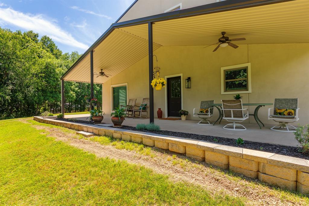 Escape to your own private retreat with this peaceful and scenic property set on over 17 acres of beautiful land. Surrounded by mature oak trees, a seasonal creek and gently rolling countryside views, this fully fenced and gated property offers privacy, tranquility and space to enjoy nature.

The immaculate 3 bedroom barndominium features numerous recent updates including a new metal roof, new windows, durable stucco exterior and multilayer insulation for energy efficiency and comfort. A welcoming covered sitting porch provides the perfect place to relax
and take in the quiet surroundings and picturesque landscape.

 The residence includes a large shop and garage ideal for hobbies, equipment storage, or workspace. With over 17 acres of usable land, there is ample space to build an additional home, making it perefect for multigenerational living, guest house, office or investment potential.

 Located within the highly rate Van Alstyne independent School District and close to shopping and easy commute, this property offers a perfect blend of Ag exempt private country living. Explore the endless opportunities.