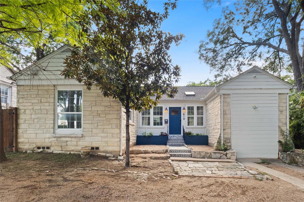 Nestled beneath a canopy of mature trees, 619 N Hampton Rd is the kind of home that instantly feels like a retreat, quiet, soulful, and full of character. Just minutes from Bishop Arts and under 10 minutes from Downtown Dallas, this charming North Oak Cliff residence offers a rare blend of timeless warmth and thoughtful modern updates.

Inside, original hardwood floors have been beautifully refinished and paired with fresh interior paint and abundant natural light, creating an inviting, cozy atmosphere throughout. The recently renovated kitchen features stylish finishes and smart design, while the updated bathroom adds a clean, contemporary touch that complements the home’s classic appeal.

Beyond what meets the eye, major system upgrades provide peace of mind, including new city plumbing, new gas lines, and updated interior plumbing. True value that’s hard to find in a home of this era. Outside, the spacious backyard is framed by lush greenery and mature trees, offering the perfect setting for entertaining, gardening, or unwinding beneath the shade.

Whether you’re searching for a move-in-ready personal haven, an investment opportunity for short- or long-term rental use, or simply a home with soul beyond the typical cookie-cutter build, 619 N Hampton Rd is calling.