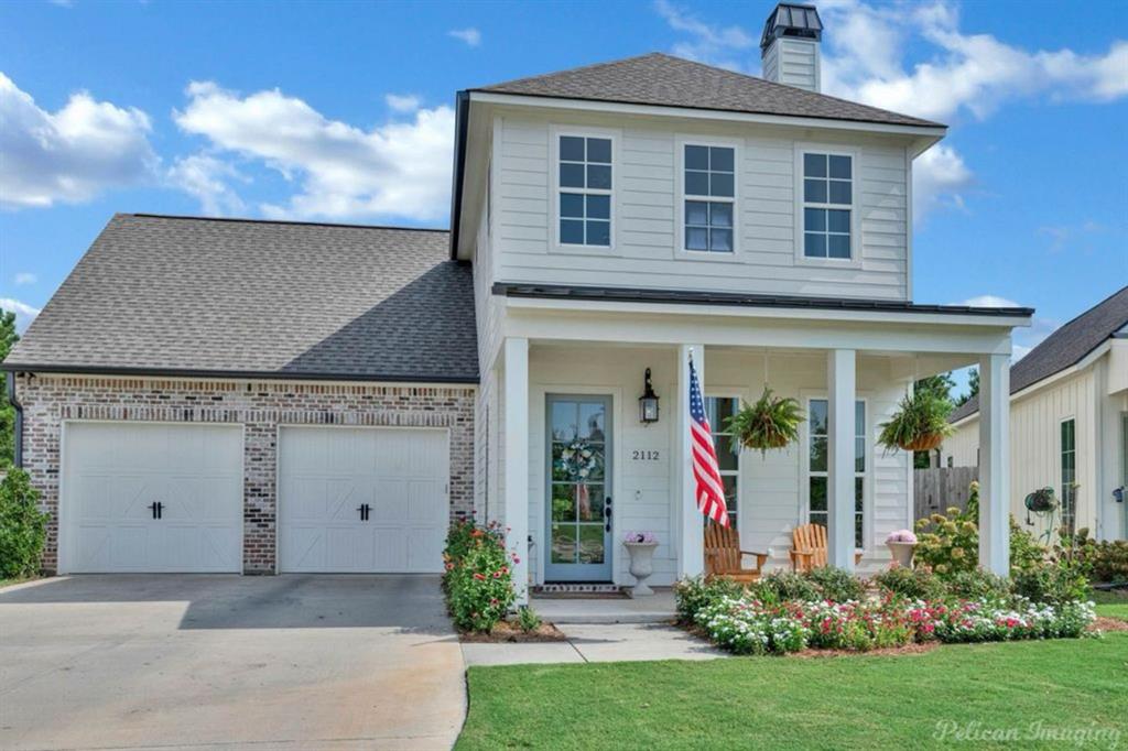 Tucked away on a quiet cul-de-sac in the gated community of The Grove at Garrett Farm in South Shreveport, this beautifully maintained home offers thoughtfully designed living space with upscale finishes & smart-home features. A charming rocking-chair front porch overlooks the community park, while inside you’ll find 10ft ceilings, wide-plank hardwood floors, crown molding, recessed LED lighting & large energy-efficient windows that fill the home with natural light. The semi-open layout provides subtle separation with a partial wall between the Great room & Kitchen, and the living area centers around a sleek fireplace with tile surround and custom mantel. The Chef’s Kitchen features quartz CTs, a large island with bar seating, soft-close shaker cabinetry, under-cabinet lighting, tile backsplash, walk-in pantry & smart SS appliances including a Wi-Fi gas range. The Dining area captures wooded greenbelt views and seasonal wildflowers. Functional spaces include a mudroom with built-in drop zone, oversized laundry w sink and storage. Stylish Powder bath. Private main-floor primary suite offers backyard views, tray ceiling detail & a spa-inspired bath with soaking tub, frameless glass shower, dual quartz vanities, linen storage & custom walk-in closet. Upstairs includes a spacious landing ideal for a 2nd living or gym, 2 bedrooms joined by a Jack-and-Jill bath w separate vanities & a large bonus room with closet perfect as a 4th bedroom, media room or office. Enjoy outdoor living on the covered rear patio overlooking a fully fenced backyard w gate access, smart irrigation & no rear neighbors. Additional highlights include a whole-home generator, tankless WH, high-efficiency HVAC w smart thermostat, security system & insulated 2-car garage. Residents enjoy 78 acres of scenic community space along Wallace Lake Rd with walking trails, greenbelts, lake views, private fishing pond & dock, minutes from shopping, dining, parks, entertainment & convenient interstate access.