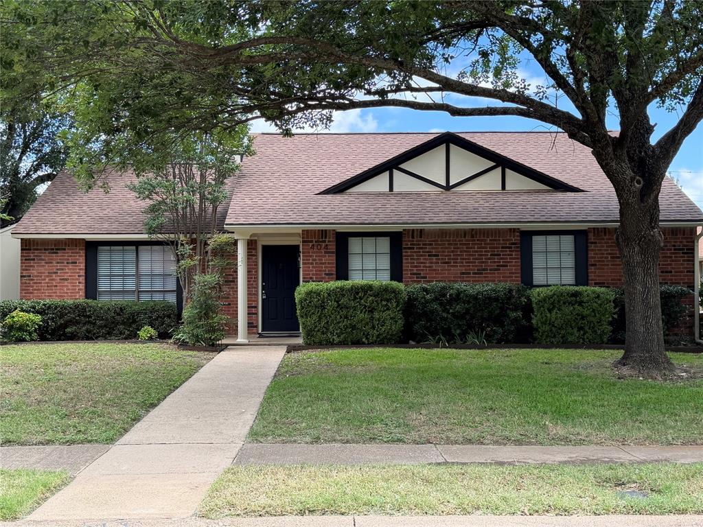 Lovely well maintained home in Cedar Hill featuring 3 bedrooms, 2 bathrooms on a large lot.  It features wood floors throughout with a wood-burning fireplace in the living area.  The kitchen includes new stainless steel appliances, and a breakfast bar.  Separated from the secondary bedrooms, the large primary bedroom offers space for retreat as well as sleep, with a walk in closet and a double sink vanity.  The property also features a concrete parking pad in addition to the garage. Buyer and buyer's agent to verify all room sizes and specs provided.