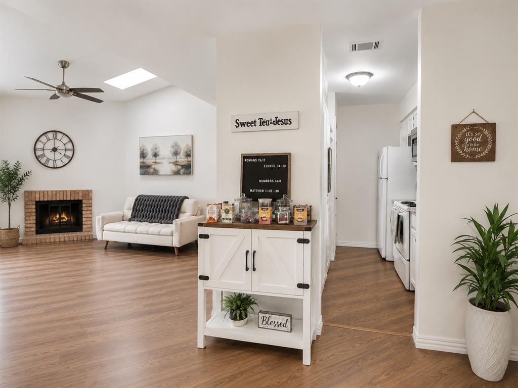 Centrally Located, Beautifully Updated 2-Bedroom, 2-Bath Condo in a Gated Community!

This move in ready, open concept condo offers 2 spacious bedrooms, 2 full baths, and an abundance of natural light from multiple skylights and large windows. Enjoy the cozy wood-burning fireplace, smart thermostat, and advanced smart-home features throughout.

The front door is equipped with a Lockly smart lock system featuring motion detection, built in camera, microphone, and remote access capabilities, allowing you to monitor and unlock the door from anywhere. The MyQ smart garage door opener also provides convenient remote access and control from your smartphone. The garage opens directly into a private locked courtyard, providing an added layer of security, privacy, and convenience.

Recent updates include a NEW HVAC system with a 10-year warranty, beautifully updated stairs and paint. The kitchen comes fully equipped, and the refrigerator plus built in washer and dryer will convey with the property. You'll also appreciate the generous storage throughout, including a walk-in attic.

Relax on your private patio or take advantage of the community's exceptional amenities, including two pools, a spa, clubhouse, and green space perfect for pets.

Ideally situated in North Dallas, this home is just minutes from the Dallas North Tollway, I-635, premier shopping, dining, and entertainment. It is also just minutes away from the proposed future DALLAS MAVERICKS arena and entertainment district!

The HOA covers water, trash, exterior maintenance of the building (including the roof and patio), as well as maintenance of the grounds and common areas.

Offering the perfect blend of comfort, convenience, security, and low-maintenance living, this turnkey condo is ready to welcome you home!