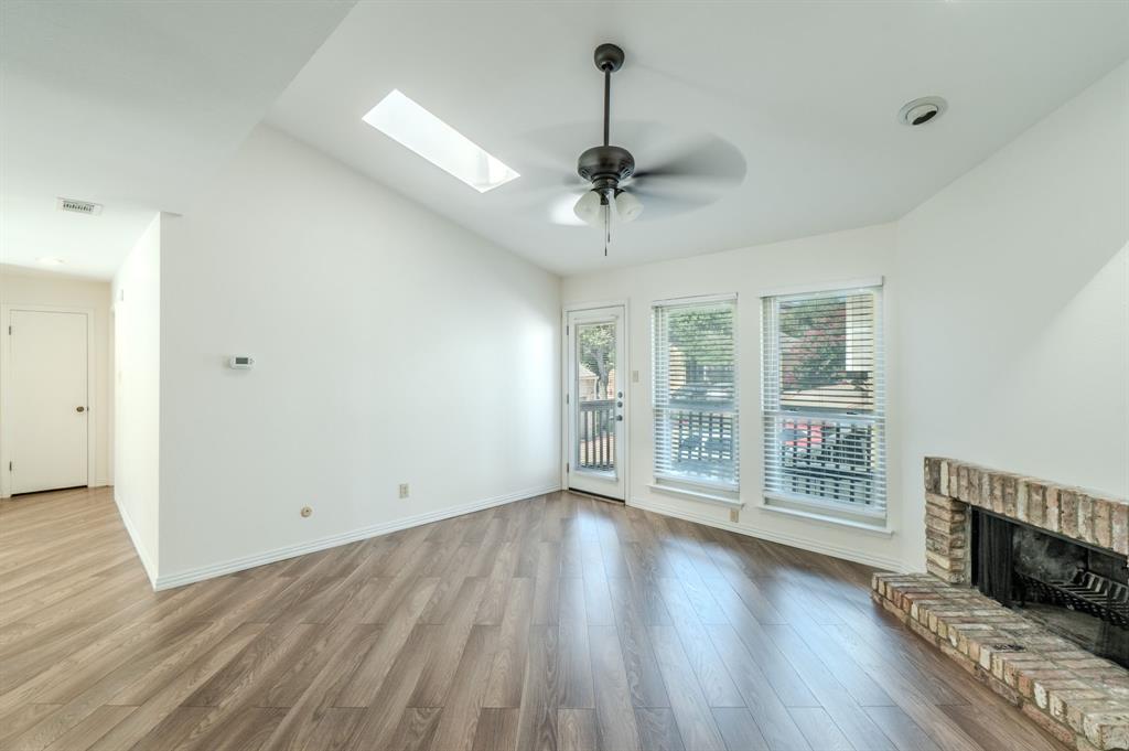 Centrally Located, Beautifully Updated 2-Bedroom, 2-Bath Condo in a Gated Community!

This move in ready, open concept condo offers 2 spacious bedrooms, 2 full baths, and an abundance of natural light from multiple skylights and large windows. Enjoy the cozy wood-burning fireplace, smart thermostat, and advanced smart-home features throughout.

The front door is equipped with a Lockly smart lock system featuring motion detection, built in camera, microphone, and remote access capabilities, allowing you to monitor and unlock the door from anywhere. The MyQ smart garage door opener also provides convenient remote access and control from your smartphone. The garage opens directly into a private locked courtyard, providing an added layer of security, privacy, and convenience.

Recent updates include a NEW HVAC system with a 10-year warranty, beautifully updated stairs and paint. The kitchen comes fully equipped, and the refrigerator plus built in washer and dryer will convey with the property. You'll also appreciate the generous storage throughout, including a walk-in attic.

Relax on your private patio or take advantage of the community's exceptional amenities, including two pools, a spa, clubhouse, and green space perfect for pets.

Ideally situated in North Dallas, this home is just minutes from the Dallas North Tollway, I-635, premier shopping, dining, and entertainment. It is also just minutes away from the proposed future DALLAS MAVERICKS arena and entertainment district!

The HOA covers water, trash, exterior maintenance of the building (including the roof and patio), as well as maintenance of the grounds and common areas.

Offering the perfect blend of comfort, convenience, security, and low-maintenance living, this turnkey condo is ready to welcome you home!
Seller is willing to help with buyer's closing costs with an acceptable offer!