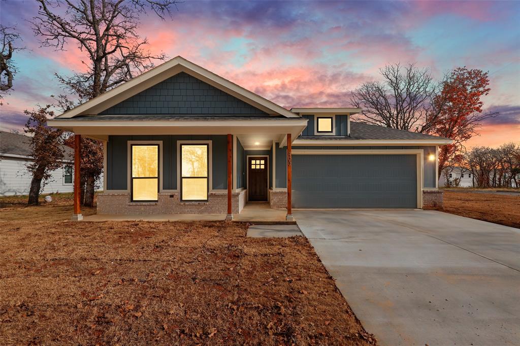 New construction, estimated completion June 2026. Seller is offering $10,000 with a contract before May 3rd. This beautiful 3-bedroom, 2-bathroom home sits on over half an acre in Hico. Walk up to the inviting covered front porch — perfect for sitting and visiting. The open living area features windows overlooking the large backyard. The kitchen hosts an island ideal for casual meals or entertaining, with an adjacent dining area that allows for great flow. The generous living room offers plenty of natural light and is central to the home. Tucked away is the primary bedroom with an ensuite bath and a large walk-in closet. The two secondary bedrooms are in a separate wing and share a hall bathroom. From the attached 2-car garage, enter through a utility mudroom large enough for laundry and additional storage. Similar homes by the same builder are available nearby for preview. Incentives available, including programs for first responders and educators — contact listing agent for details.