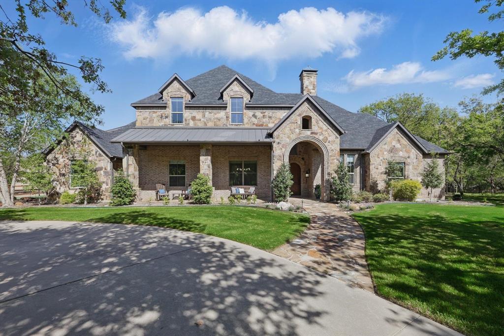 Experience true comfort at this stunning Double Oak property spanning 5 acres of trees, pasture, and paddocks, featuring an elegant updated home,  screened porch, flagstone patio, outdoor cabana, pole barn, pony barn, private well, and gated entrance with a call box. Every detail has been thoughtfully curated by the owners, resulting in a fabulous retreat.

The 2021 house renovation seamlessly blends modern design with everyday functionality. Enjoy morning coffee on the east-facing patio while watching the ponies play in the pasture. The specialized utility room makes chores like laundry and dog bathing fun! Happy hour is the happiest in the outdoor cabana, enhanced with chandeliers, a cozy fireplace, and a pizza oven. As the day ends, watch the sun set on the front porch and relax with a movie in the media room. Each bedroom offers a tranquil escape with its own beautiful bathroom. Life here is truly wonderful!

In addition to a triple-attached garage, the property includes a 40 x 50 metal pole building with foam insulation, two RV-sized overhead doors, a workbench, and a storage loft. The 1-acre pasture is Ag Exempt.

Children can attend LISD Flower Mound Elementary, Downing Middle, and Marcus High Schools. Check the documents section for more information about this exceptional property.