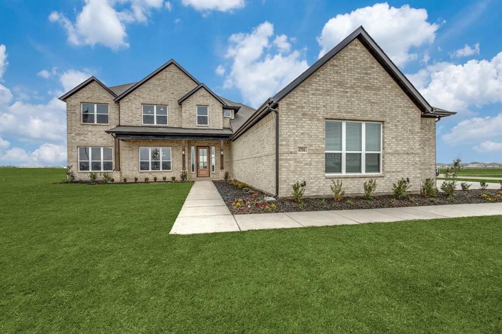 MLS# 21260252 - Built by Kindred Homes - Ready Now! ~ The Texan model home showcases a stunning collection of options and upgrades, all beautifully situated on a desirable corner lot. An extended covered entry and impressive foyer with soaring two-story ceilings flow into the expansive family room, with a view of the sought-after covered outdoor living space beyond. The spacious family room opens to the kitchen and breakfast nook, creating an ideal open-concept layout.The modern kitchen is complete with a large center island, ample cabinet and counter space, and a generous walk-in pantry. The beautiful owner’s suite features a boxed ceiling and a spacious walk-in closet, while the luxe owner’s bathroom includes separate vanities, a glass-enclosed shower, a freestanding tub, and a private water closet.A secluded guest suite is located on the first floor and includes a large closet and full bathroom. Upstairs, two bedrooms with walk-in closets share a full bath, while an oversized game room, sitting area, and loft provide plenty of space for relaxing, working, or entertaining.Additional highlights include a private study, dining room, powder bath, centrally located laundry room, and abundant storage throughout.