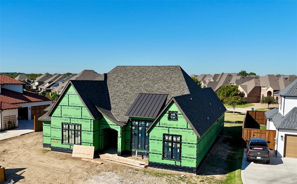 Stunning New Construction! Custom Home built by Dean & Co Custom Homes located in the coveted community of Trophy Club known as Falcon Estates. Hard to find single story. 4 bedroom, 4 bath home offers everything you could want for luxury living. Featuring indoor and outdoor living areas, study, flex room or can be storage room and media room. Engineered wood floors and cozy 42 inch gas fireplace. The gourmet kitchen with Thermador appliance package. Step outside to your huge covered screened porch with gas fireplace and built in grill.  House is under construction so buyer can help with selections. Estimated completion Spring 2026. This is the last lot available in Falcon Estates.