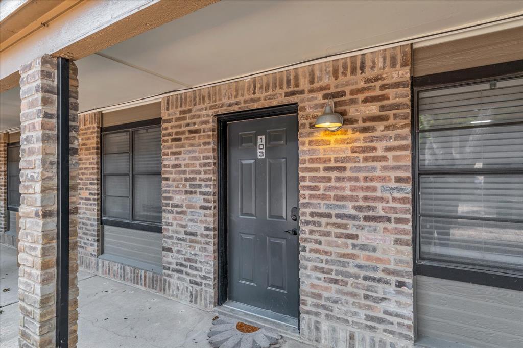 Gated Casa Blanca condominium featuring 2 bedrooms and 2 bathrooms. Functional layout with defined living and dining areas, tile flooring in main spaces, and wood-look flooring in bedrooms. Primary bedroom includes an attached bathroom. Community pool on site. Conveniently located minutes from Baylor University, Downtown Waco, and I-35.