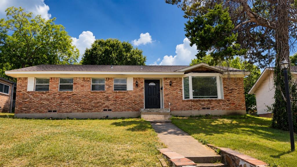 Welcome home to this beautifully updated single-story retreat nestled in an established Dallas neighborhood. From the moment you arrive, you’ll appreciate the timeless brick exterior, inviting curb appeal, and modern black front door that sets the tone for what’s inside.

Step into a bright, open layout featuring rich wood-look flooring, fresh neutral finishes, and abundant natural light throughout. The remodeled galley kitchen offers crisp white cabinetry, sleek countertops, stainless steel appliances, and generous cabinet space, making it the perfect place to prepare meals while staying connected to the living and dining areas.

The spacious living area provides the ideal setting for relaxing evenings, entertaining family and friends, or creating memories that will last a lifetime. Both bathrooms have been tastefully updated, including a beautifully tiled walk-in shower that brings a spa-like feel to your daily routine. Comfortable bedrooms offer flexible space for family, guests, or a home office.

Enjoy added peace of mind with a roof and HVAC system replaced in 2023, providing valuable updates for years to come. Outside, enjoy a large backyard ready for weekend barbecues, gardening, pets, or simply unwinding after a long day. A two-car attached garage provides plenty of parking and additional storage.

Conveniently located with easy access to major highways, shopping, dining, parks, and Downtown Dallas, this move-in ready home combines modern updates with everyday comfort in a location you’ll love.

Buyer and Buyer’s Agent to verify all information, including but not limited to square footage, schools, taxes, restrictions, measurements, and any other information contained herein.