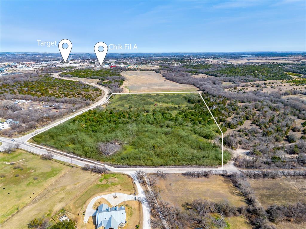 Prime location approximately one mile from I20 and Highway 51, making this site ideal for commercial and or mixed-use development. The property is strategically positioned just south of the future HEB, west of Chick fil A, and north of an upcoming residential development by Riverside Home Builders placing it at the center of rapid growth.
The site offers outstanding access with approximately 1,200 feet of frontage on BB Fielder Road and 1,000 feet of frontage on Tin Top Road. Three Mile Branch runs through the western portion of the property, providing a natural feature that could be incorporated into future development plans.
Predevelopment discussions with the City of Weatherford support commercial and or residential use, making this a flexible and highly desirable investment opportunity.