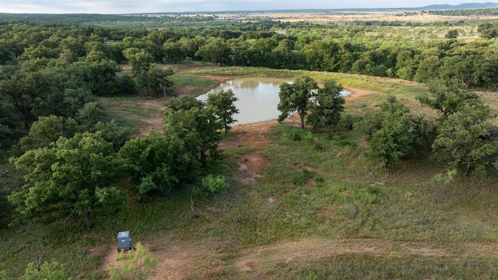 180 Acre Prime Recreational & Hunting Ranch Full of Oak Trees in Jack County*Great Cattle Ranch as well*Ag Exempt*2022 3 Bedroom, 2 Bath Manufactured Home with Electric & a 300 Ft. Well for Water, 1620 Sq. Ft., Front & Back Decks to watch the sunrise & sunsets*Fully Furnished with Refrigerator, Washer & Dryer, Furniture*Aerobic Septic*Barn with piers to store things or use as a Workshop*Elevation Changes up to 200 ft.*Live Creek*1 Pond, 12-15 ft. Deep*2 other potential areas for Large Ponds*Cattle Pens*Deer, Turkey, Hogs*No Oil & Gas Production or No Windmills on Ranch besides 1 Gas Pipeline*2 Deer Blinds, 2 Corn Feeders, 1 Protein Feeder are Negotiable*Property is right off of HWY North 281*Hour and a half from the Metroplex