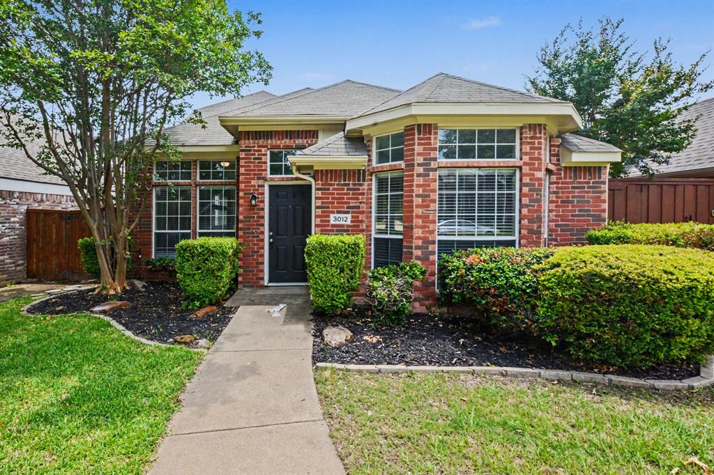 Nestled in one of Plano's most desirable neighborhoods, this charming 3-bedroom, 3-bathroom home offers 1,932 square feet of thoughtfully designed living space — and an exceptional value that's hard to beat.
Ideally situated between 75 Central and Preston Road, this home places you minutes from an abundance of shopping, dining, and everyday conveniences. Nature lovers will appreciate the walkability to both Chisholm Trail Park and Jack Carter Park, while families benefit from proximity to highly regarded Schimelpfenig Middle School. This is a location that truly delivers on lifestyle and accessibility.
Step inside to discover low-maintenance flooring throughout and a warm, neutral color palette that creates an inviting canvas for any décor style. The kitchen is a standout, featuring pretty granite countertops, a generous island, and a breakfast bar perfect for casual meals and entertaining. Two spacious living areas provide plenty of room to spread out, while the primary bedroom serves as a true retreat with its ensuite bath and generous proportions.
Out back, a low-maintenance yard and rear drive with alley access add practical convenience to everyday living. For investors eyeing the thriving Plano rental market, this home's desirable location, versatile layout, and 2 full bathrooms and a powder bath make it an outstanding income-generating opportunity.
Whether you're searching for your next home or a smart investment in a flourishing neighborhood, 3012 Ridge Hollow Dr checks every box. Schedule your private showing today!