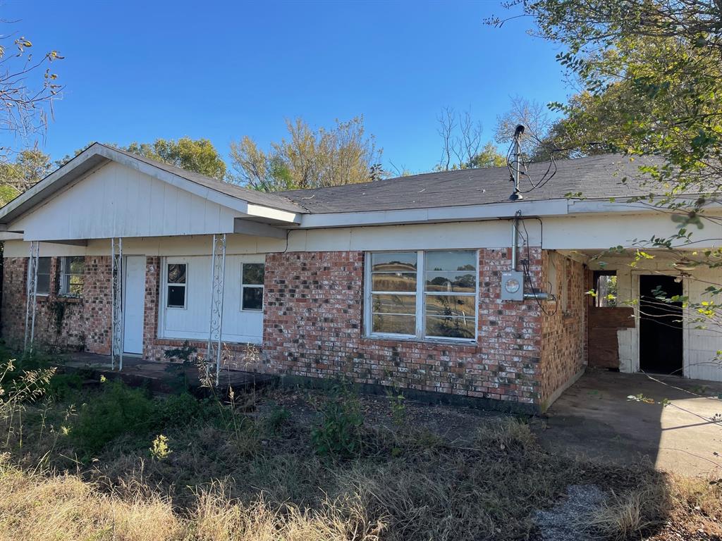 This 3 bedroom, 2 bath brick home has great potential to become a beautiful home or investment.  The desirable location offers close proximity to town amenities.  With great potential throughout, this home offers the perfect opportunity to add your personal touches and make it truly yours.