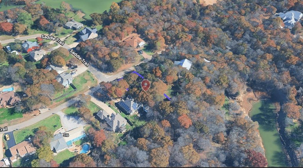 Live close to Lake Lewisville on this fantastic opportunity in Little Elm! This unique property includes two lots, total of .55 acres— one featuring an existing home and an additional wooded lot offering endless possibilities. Nestled among mature trees, this property provides privacy and a peaceful setting while still being conveniently located near Eldorado Parkway and the Toll Bridge for easy commuting. Whether you're looking to build your dream home, customize the current residence, or invest in future, this is the perfect blank slate to bring your vision to life. Enjoy the charm of lake living with the flexibility to create exactly what you want in a rapidly growing area.