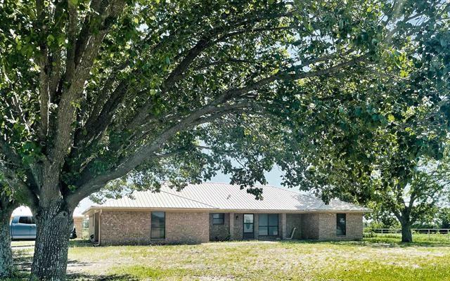 Welcome to this beautifully updated property located in the countryside of Cunningham, Texas. This spacious 3-bedroom, 2-bathroom home boasts numerous features that will delight any homeowner. The large bedrooms are perfect for accommodating a growing family or hosting guests. The newer appliances in the kitchen make cooking and entertaining a breeze. New flooring is also an added bonus! With 2 acres of land, you will have ample space for outdoor activities or gardening. The property also includes an approx. 480 sf building, which was previously used as a barber shop but could be easily converted to a mother-in-law suite, a shop, or a storage building - the possibilities are endless! If you are looking for a peaceful country setting, then look no further! This property is located in Cunningham, Texas.