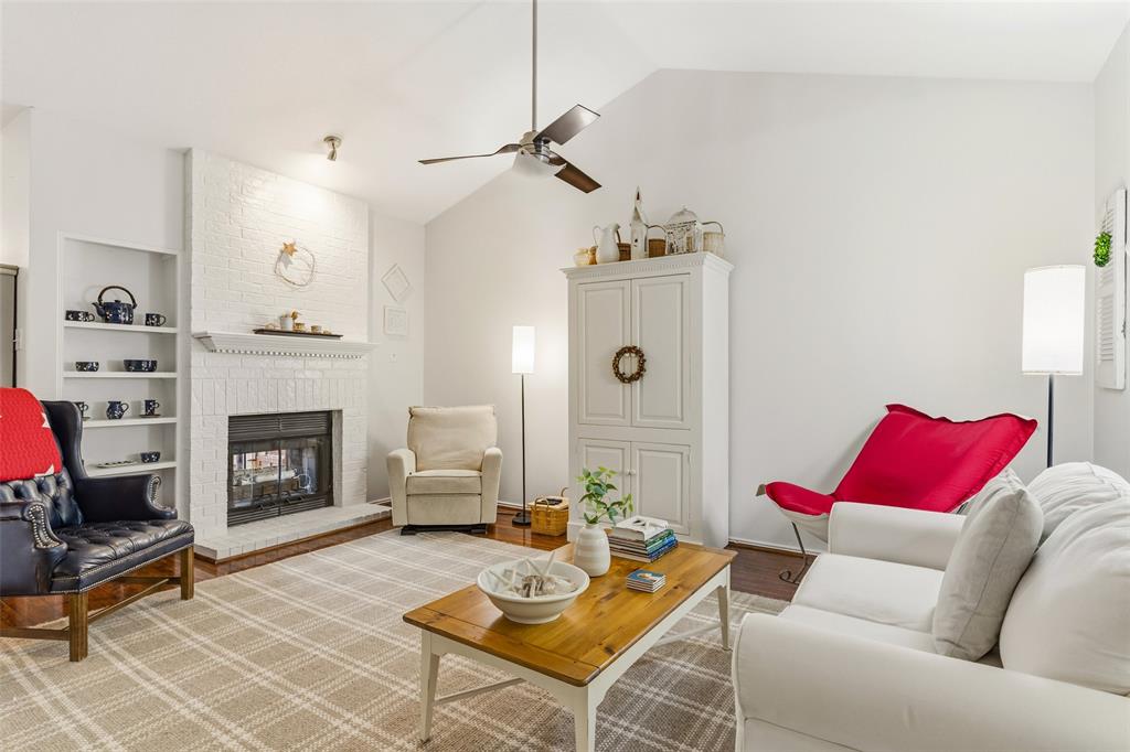 Tucked inside a gated, tree-lined community, this beautifully maintained 2-bedroom, 2-bath condominium offers comfort, charm, and an unbeatable location in the heart of Dallas. Ideally positioned near the center of the community, this inviting home enjoys peaceful courtyard views from the deck and a front outlook framed by mature trees with glimpses toward the Dallas skyline. Inside, the spacious living room welcomes you with a vaulted ceiling, rich character, built-in bookcase, and French doors that open to the private deck, creating a bright and airy atmosphere. A striking two-sided fireplace serves as a warm focal point, shared between the living and dining areas for effortless everyday living and entertaining. The functional floor plan includes two bedrooms and two full baths, offering flexibility for guests, a roommate setup, or a home office. Thoughtful updates add value and peace of mind, including replaced windows, a new washer and dryer, a new dishwasher, exterior AC unit replaced in 2021, and interior air handler replaced in 2026. Residents enjoy access to exceptional community amenities, including a clubhouse with fitness center, two pools, and two hot tubs, along with a covered parking space and additional guest parking. Conveniently located with quick access to Medical City and TI, I-75, 635, and the Dallas North Tollway, this Preston Hollow gem offers the perfect blend of privacy, convenience, and low-maintenance living in one of Dallas’s most desirable areas. Schedule your showing today!