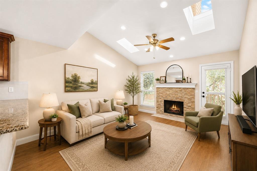 MOTIVATED SELLER! Experience upscale living in this beautifully remodeled, light-filled upstairs condo located just minutes from Addison, the Galleria and the Dallas North Tollway. This one-of-a-kind 1-bedroom, 1-bath was completely remodeled in 2016. It was taken down to the studs and the difference it makes in the look and feel of the property is noticeable.  It's a perfect blend of luxury, convenience, and style within a quiet gated community. The open-concept floorplan showcases luxury wood-look vinyl plank flooring, brand-new carpet, an abundance of natural light and a striking stacked stone fireplace that creates a warm and inviting atmosphere. The spacious kitchen features granite countertops, an abundance of cabinets, generous prep space, and flows seamlessly into the living and dining areas, making it ideal for everyday living and entertaining. The beautifully updated bathroom includes stylish designer finishes and a modern tile shower surround, while the oversized bedroom offers a full wall of closet space.  Refrigerator, washer, and dryer are included as well as a secure one-car garage conveniently located directly below the unit. Residents enjoy access to two sparkling pools and an outdoor kitchen area, all while being within walking distance to Whole Foods, Trader Joes, shopping, dining, and entertainment. This move-in-ready condo offers an unbeatable lifestyle in an exceptional location. NEW Windows 2026, AC 2021, water heater 2022.Come see!