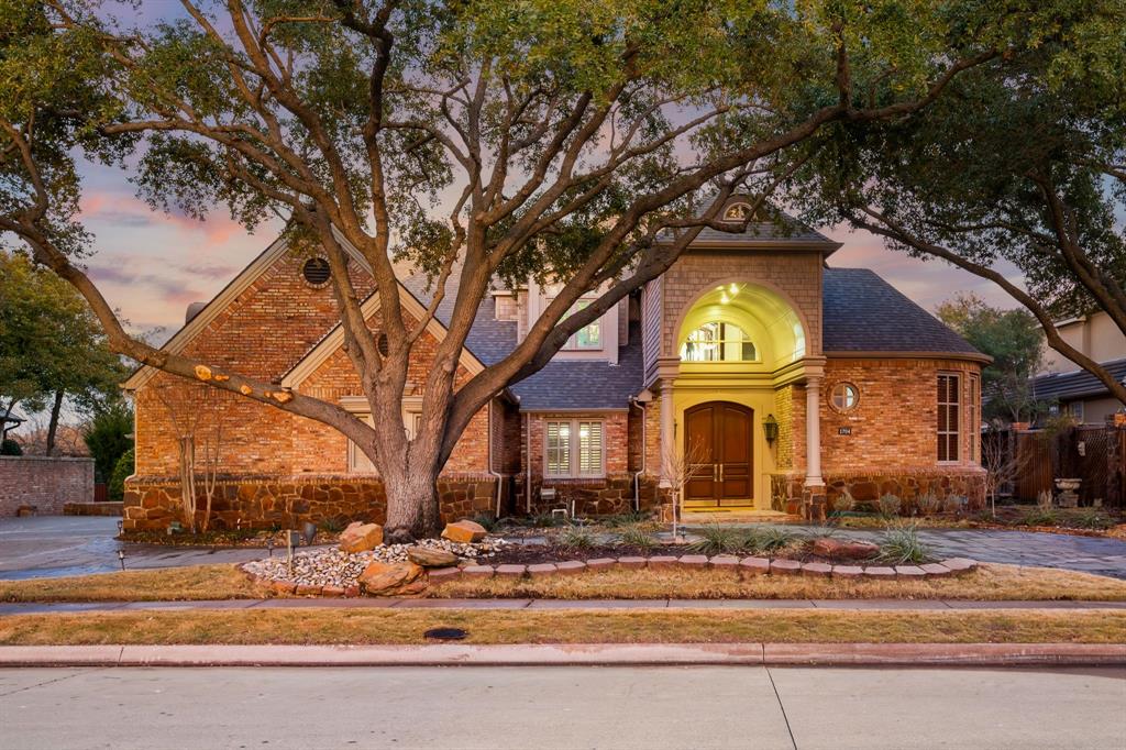 Set within the exclusive, guard-gated Cliffs of Gleneagles, this exceptional Bob Thompson estate offers 5 bedrooms, 5 full baths, and 2 half baths with breathtaking, unobstructed views of the lake and multiple holes of the Gleneagles Golf Course. Elegant architectural details set the tone from the moment you enter, with expansive formal living and dining rooms showcasing soaring ceilings and dramatic floor-to-ceiling windows that frame the scenery. The heart of the home is a top-of-the-line kitchen designed for serious cooking and effortless entertaining, featuring upscale, professional-grade appliances, a warming drawer, and the rare convenience of dual dishwashers and dual sinks. The oversized primary suite is a true sanctuary with tranquil views, a cozy fireplace, cedar closet, and a spa-inspired bath complete with a steam shower. A handsome study with custom built-ins and double etched-glass doors is complemented by a separate, hidden office for added privacy. Upstairs, enjoy a large game room with wet bar and a balcony perfectly positioned to take in panoramic vistas of Gleneagles Country Club, White Rock Creek, and the surrounding greenbelt. An incredible opportunity to secure a historically resilient Gleneagles estate perfectly positioned near $2.5B+ in upcoming developments, offering exceptional long-term growth potential. Outdoor living is resort-style with a pool and spa featuring heating, lighting, and waterfall elements—made for both quiet relaxation and lively gatherings. Just minutes from the Dallas North Tollway and George Bush Turnpike, this home delivers the ideal blend of privacy, luxury, and convenience—schedule your private showing today!