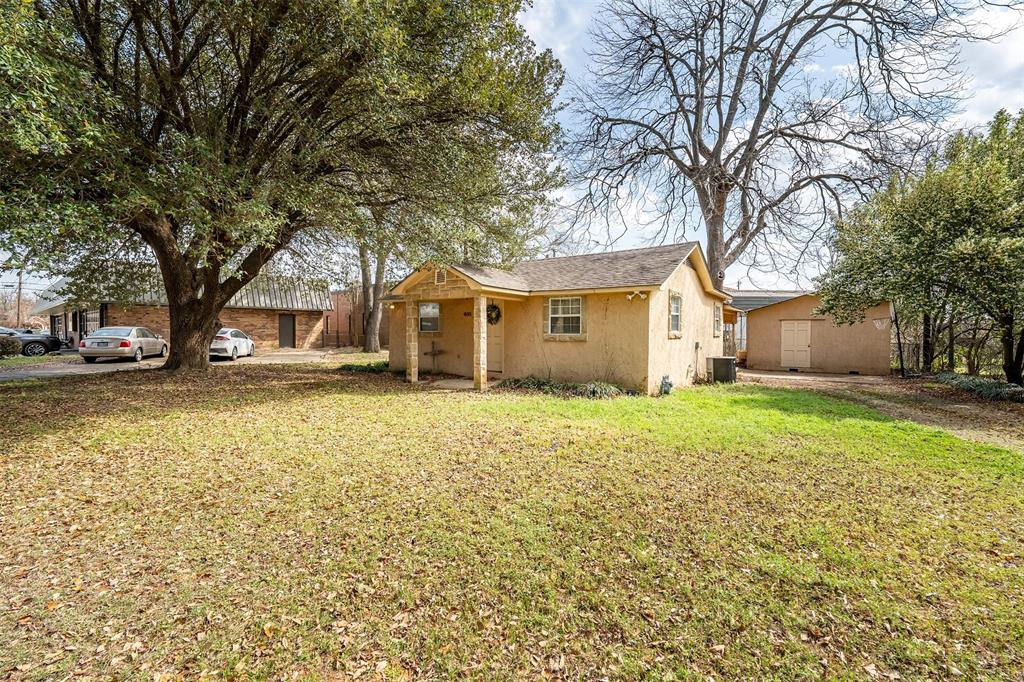 2 bedroom, 1 bath INCOME GENERATING property! Currently tenant occupied and wants to stay. This property has a covered parking space and detached storage building. Tucked away on a lovely street, this home would make a great single-family home or continue as rental property.