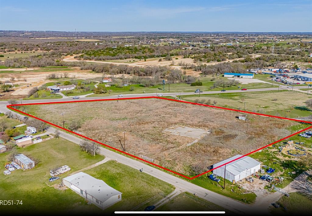 4.64 Acres 430’ Frontage on FM 51 No Zoning

Located just 6 miles north of I-20, this 4.64-acre Tract at 173 Green Branch Road offers a rare opportunity to secure well-positioned land in one of Parker County’s fastest-growing corridors. With approximately 430 feet of frontage along FM 51, the property provides excellent visibility and access.

The site is outside city limits with no zoning, allowing exceptional flexibility for a wide range of potential uses, including:

Residential development

Small-scale commercial

Long-term investment or land banking

Additional property features include an existing water well and septic system. Travel times are highly convenient, with I-20 reachable in approximately 5 minutes and Fort Worth accessible within 25–30 minutes.

This tract combines location, accessibility, and development versatility—an ideal opportunity for investors, builders, or owner-users looking for strategic land in Parker County.