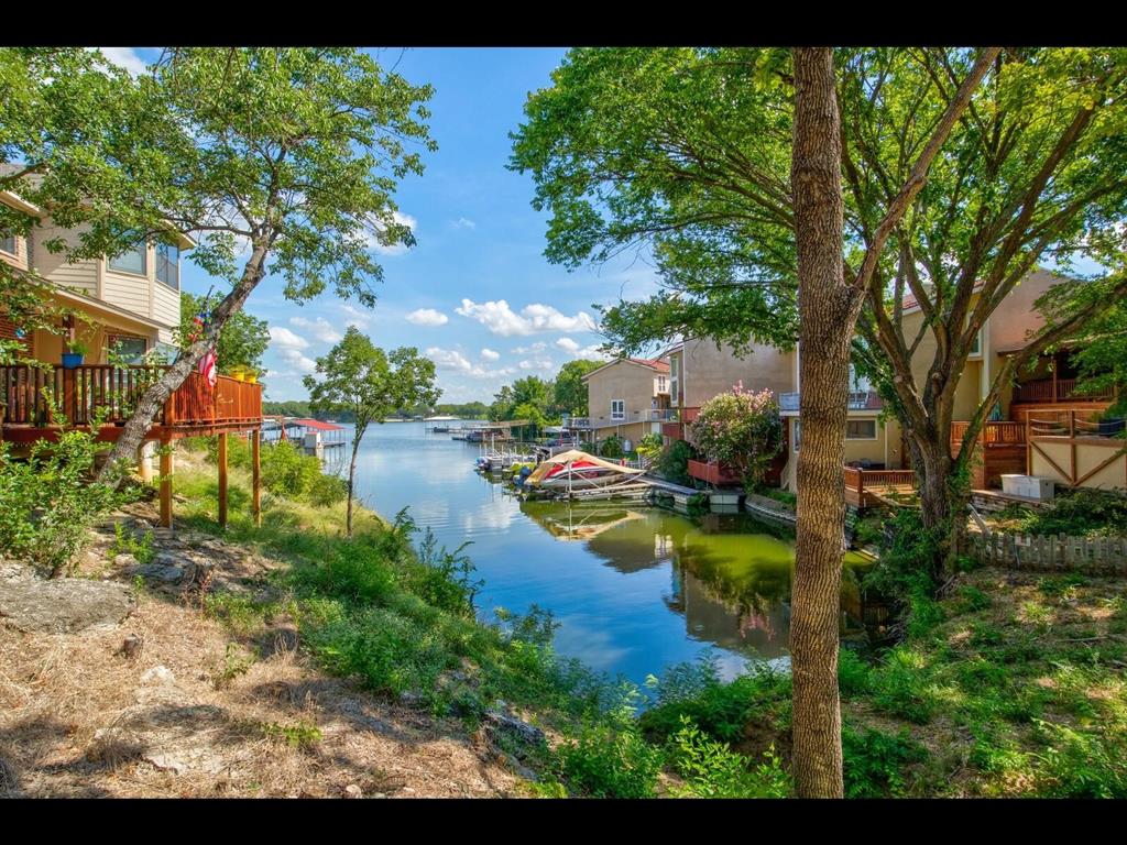 Property is located in highly desirable Lake Country Estates and is so close to the water you are nearly lakefront. No Mandatory HOA. There is a voluntary Property Owners Association that cost that gives you access to a beautiful park and private gated boat launch. Gated cul-de-sac with only 5 lots and all utilities available, including natural gas, city water, city sewer, electricity, phone, etc. Neighborhood community offers boat ramp, community dock, tennis courts, green belts, playground, and picnic areas all within walking distance.