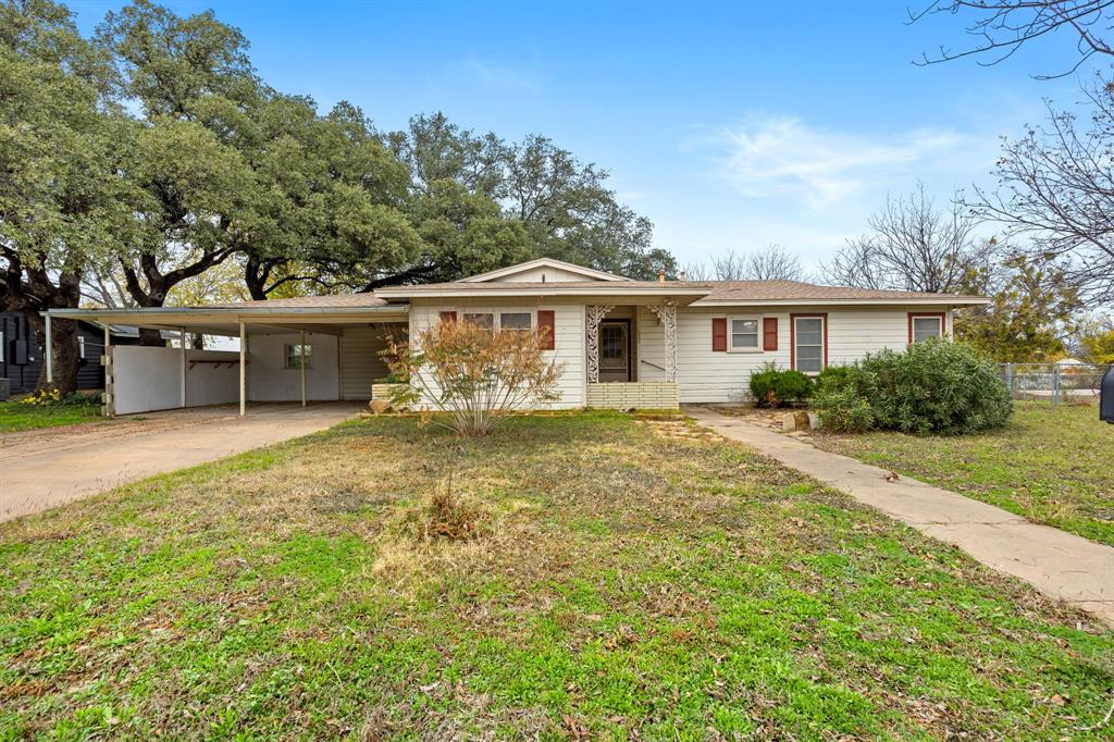 Welcome to this well-kept 3 bedroom, 1 bath home offering nearly 1,500 sq ft of comfortable living on two lots in a quiet, established neighborhood. Sitting on a corner lot, this property provides extra space and a sense of openness that’s hard to find.

Inside, you’ll find original hardwood floors and granite countertops, blending classic character with modern touches. The home features central heat and air, along with both electric and natural gas, keeping things efficient and dependable year-round.

Out back, enjoy a fully fenced yard, a 2-car carport, and a 600 sq ft shop, perfect for weekend projects, storage, gardening, or simply having room to tinker. This home offers a true blank slate. Ready for your vision, your updates, and your personal touch. With two lots and plenty of room to grow, the possibilities here are truly endless. A rare opportunity to create exactly what you want while enjoying the charm and pace of small-town living.