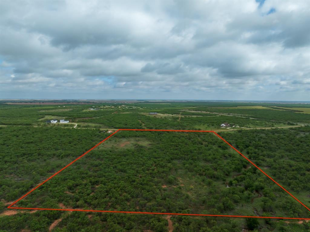 Escape the noise and discover the freedom of wide-open West Texas living on this 13.4-acre tract in Hawley. Tucked away on a private road, this unimproved property offers the perfect balance of privacy, space, and convenience. With water and electricity available, it's ready for you to bring your vision to life; whether that's a custom dream home, a barndominium, or a peaceful weekend retreat.
Imagine mornings spent watching deer move through the native landscape, evenings gathered under endless Texas skies, and sunsets that paint the horizon in shades of gold, orange, and crimson. Here, you'll enjoy a genuine connection to nature without sacrificing access to modern amenities.
At 13.4 acres, this property offers room to breathe and the privacy you've been craving. Large enough to feel secluded, yet manageable enough to maintain without dedicating every weekend to upkeep. Enjoy the tranquility of country living while remaining just a short drive from Abilene, Dyess Air Force Base, shopping, dining, healthcare, and the growing energy of downtown Abilene.
If you've been searching for the perfect place to build your future, this beautiful Jones County tract offers the space, setting, and opportunity to make it happen.