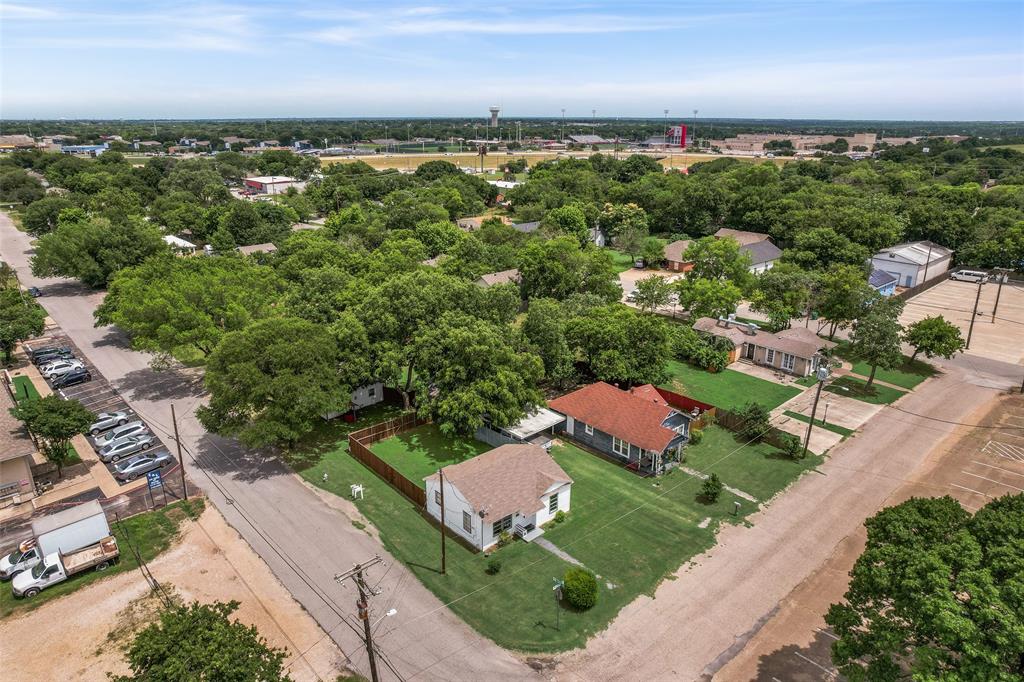 Rare investment opportunity in the heart of downtown Cedar Hill! Situated on nearly one-half acre, this unique property includes three separate homes plus a workshop, offering endless possibilities for investors, business owners, or developers. Property is currently equipped with three water meters, three electric meters, and three gas meter hookups, providing flexibility for multiple uses. Prime location with excellent visibility and easy access to downtown businesses, shopping, dining, and major thoroughfares. Potential for rezoning may create additional commercial opportunities (buyer to verify with the City of Cedar Hill). Whether you're looking for rental income, redevelopment potential, or a live-work investment, this property offers exceptional value and versatility. Cash or conventional financing only. Don't miss this rare chance to own a high-potential property in one of Cedar Hill's most desirable growth areas!