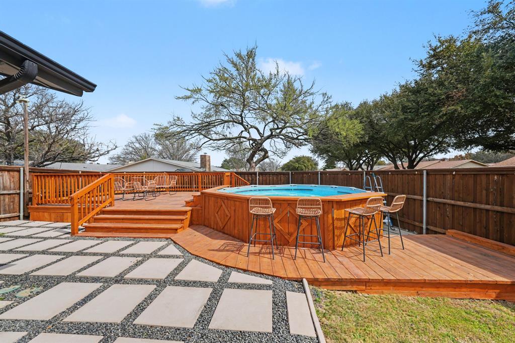 NEW PRICE - INCREDIBLE VALUE! Don’t miss the opportunity to own this beautifully updated 2 living areas, 3-bed, 2-bath, 2 car garage home with a NEW above-ground swimming pool, ideally located in the highly sought-after Park Forest subdivision of Plano. Set on a generous 0.22-acre corner lot, this inviting residence offers 1,989 SF of comfortable living space and a thoughtful blend of modern upgrades, style, and functionality. Conveniently positioned just minutes from Highway 75, 121 and the DNT, the home provides easy access to commuting, shopping, dining, and entertainment. Inside, you’ll find a bright open-concept layout featuring new Premium LVP flooring throughout the main living areas and bedrooms, with tile flooring in the baths. The spacious kitchen is designed to impress, complete with quartz countertops, a center island, white cabinetry, SS appliances and an oversized pantry offering plenty of storage. The main living area is anchored by a beautifully redesigned white brick fireplace that adds warmth and character, while updated lighting and smart home features enhance both comfort and efficiency. Step outside to enjoy the backyard retreat, featuring a covered patio and a new above-ground swimming pool with a spacious deck & bar area, perfect for relaxing or entertaining guests. A full list of upgrades and improvements is available on MLS. Located within the highly acclaimed Plano ISD and close to parks, shopping, dining, and major highways, this home offers the perfect combination of location, upgrades, and lifestyle. Move-in ready and full of charm, this Plano gem is ready to welcome its next owner. Schedule your private tour today!