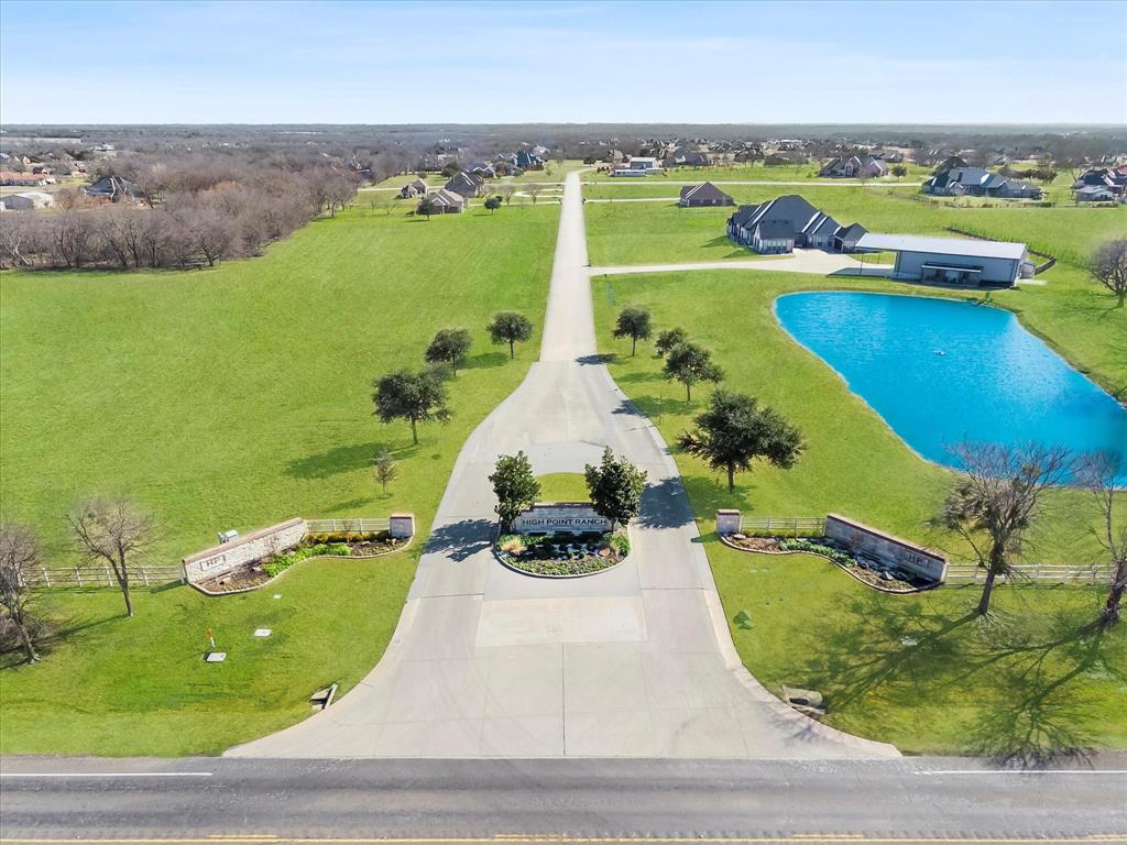 SELLER FINANCE AVAILABLE: Build Your Legacy on 2 Acres in Rockwall County- WITHOUT CITY TAXES! Escape the ordinary and create something truly special at 649 Horseshoe Bend. Rare opportunity in sought-after High Point Ranch! Very few lots remain in this prestigious custom home community. This expansive 2-acre homesite offers the space, privacy, and freedom today’s buyers crave — This level lot backs to a scenic tree line, offering privacy and a peaceful backdrop.  Surrounded by 1 Million dollar homes Imagine designing a custom estate with a treelined lot behind the residence, room for outdoor living, a pool, horses, shop, or guest quarters, surrounded by open skies and quiet countryside. The property’s usable terrain makes it ideal for a wide range of custom designs while maintaining a serene, private setting. Conveniently located just minutes from I-30, SH 205, The Harbor at Lake Ray Hubbard and downtown Royse City, this property offers luxury through space, freedom, and potential — a rare combination in today’s market. Enjoy the community's picturesque hike and bike trails, which wind past a playground and lead to a stunning 100-acre private lake. Spend your days fishing from the dock, kayaking, or canoeing in tranquil waters.