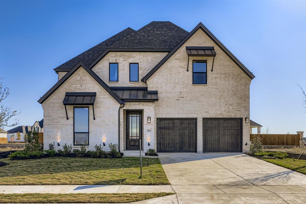 Located on a desirable North facing lot in the prestigious Star Trail community, this stunning 5 bedroom, 4.5 bath home offers luxury, functionality and thoughtful design. The 1st floor features a spacious main suite with a spa-inspired bath, complete with a large shower, freestanding tub and dual walk-in closets. A secondary bedroom with a full bath and a private office also grace the first level, perfect for guests or multi-generational living. The heart of the home is the chef’s kitchen showcasing ceiling-height cabinetry, a striking waterfall island and commercial-grade appliances. It seamlessly flows into the dining area and impressive two-story living room, anchored by a fireplace with floor-to-ceiling surround. Expansive sliding glass doors open to a covered patio, ideal for indoor-outdoor entertaining. Upstairs, you’ll find three additional bedrooms, two full baths, a large game room and a fully wired media room ready for movie nights. Upgrades are abound, including extensive hardwood flooring, elegant wood staircase treads and premium finishes throughout. This home blends sophisticated style with modern comfort while offering plenty of room to live, work and play in one of the area's most sought-after neighborhoods. A must-see for those seeking elevated living in Star Trail.