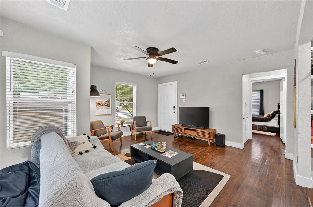Charming home nestled in the Alamo Heights neighborhood! This adorable home features beautiful original hardwood floors throughout and an inviting open floor plan perfect for modern living. The updated kitchen boasts granite countertops, an eat-in dining area and opens up to the warm & inviting living room. Spacious, oversized bedrooms offer comfort and flexibility, while the renovated bathroom showcases a huge walk-in shower. Step outside to the large backyard that is shaded by mature trees which is perfect for relaxing or fun gatherings. Conveniently located just minutes from Colonial Country Club, the Japanese Gardens, the Fort Worth Zoo and more! This home combines charm, comfort and an unbeatable location! Home also would make a great rental or short term rental!