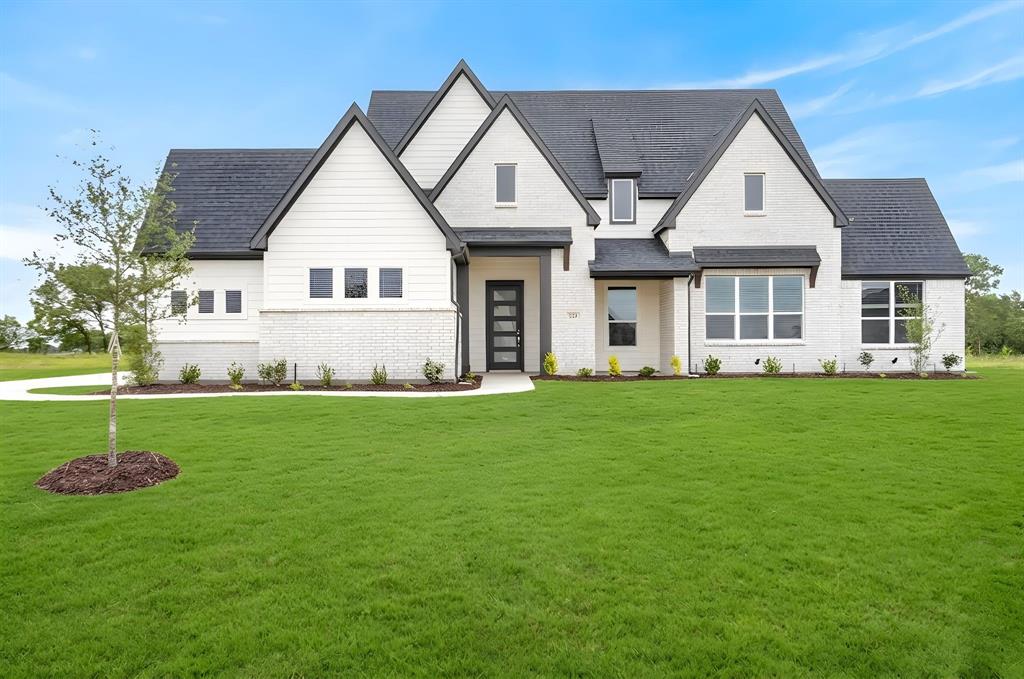 Welcome to the stunning Blaire floorplan by Elmwood Homes, offering 2,729 square feet of thoughtfully designed living space in the highly sought-after Waxahachie ISD. This move-in ready new construction home features 4 spacious bedrooms, 2.5 bathrooms, a dedicated study, and a versatile gameroom—perfect for entertaining, working from home, or creating the ideal flex space for your family’s needs. The inviting family room showcases a breathtaking vaulted ceiling that adds warmth, natural light, and an open-concept feel throughout the heart of the home. Designed with both comfort and functionality in mind, this home also includes a 500-gallon propane tank and quality craftsmanship that Elmwood Homes is known for. From the spacious layout to the designer finishes and modern touches throughout, every detail has been carefully curated to create a home that is both stylish and practical. Don’t miss the opportunity to own this beautiful move-in ready home that perfectly blends luxury, comfort, and everyday living.