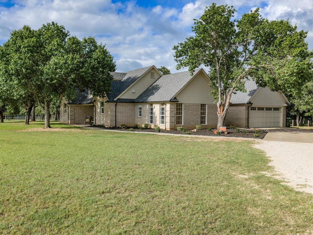 Set on 30 beautiful acres at the end of a quiet road, this charming 3-bedroom, 2-bath farmhouse offers the space, comfort, and flexibility that make country living so appealing. Surrounded by mature trees and open pasture, the property provides a sense of privacy and tranquility while still being practical for everyday life.
Inside, thoughtful updates blend seamlessly with the home’s welcoming character. The remodeled kitchen is a standout feature, complete with a 36-inch Wolf range and a large island that serves as the natural gathering place for family and friends. The living room feels warm and comfortable with its wood-burning fireplace, while updated bathrooms and tasteful finishes throughout create a home that is both functional and inviting.
Outside, the property is ready for whatever country life looks like to you, with mature trees, open pasture, and partial cross-fencing already in place for livestock. A charming guest cottage adds even more versatility, offering the perfect space for visiting family and friends, weekend guests, movie nights, game nights, or a private retreat of your own. Whether you’re raising cattle, keeping horses, starting a small homestead, or simply enjoying the extra space and privacy, this acreage offers the flexibility to fit your lifestyle.
Rarely do you find a property that combines a beautifully updated farmhouse, a guest cottage, and 30 usable acres in such a peaceful setting. Comfortable, versatile, and full of country charm, this is a place you’ll love coming home to.