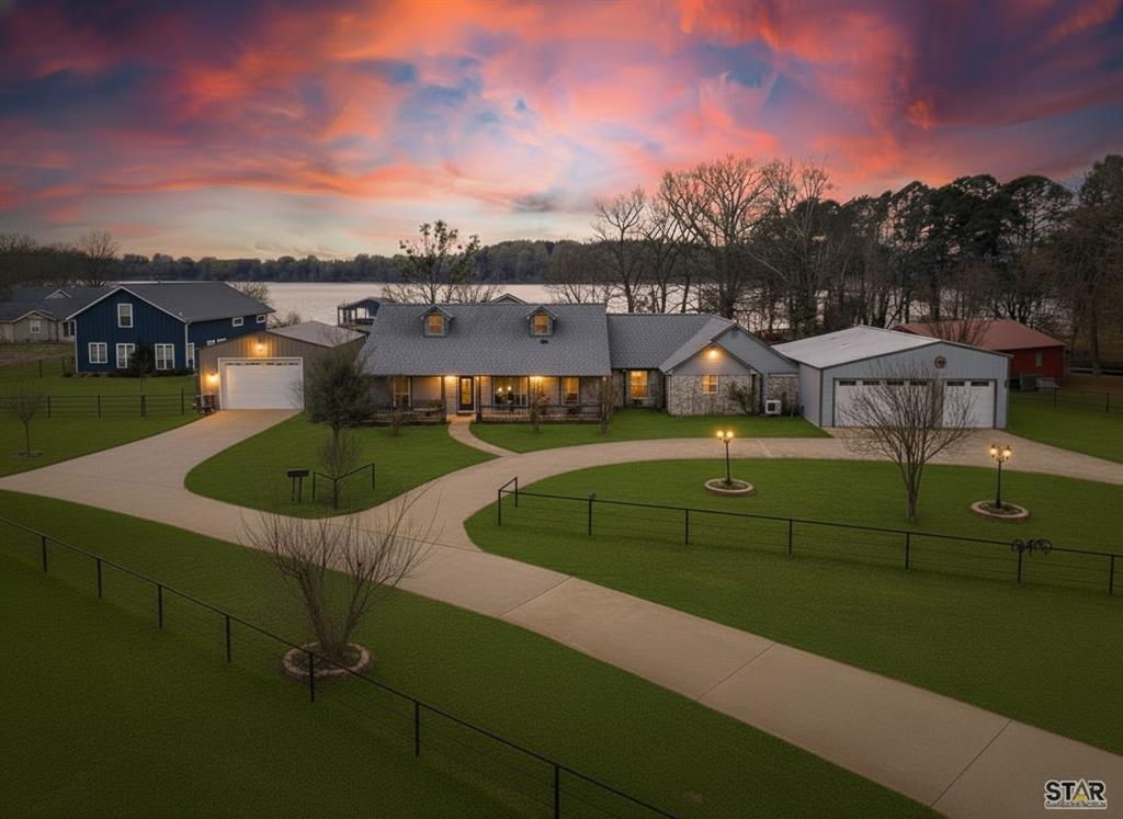 WATERFRONT HOME WITH NEW BOATHOUSE ON NEARLY 1 ACRE, Lake Bob Sandlin

It's Not Just A Lake House - It's Home!

Experience the pinnacle of East Texas lake living in this updated 3-bedroom, 3-bath home. Spanning 2,900 sq. ft. on nearly one acre, this property offers panoramic water views and modern upgrades, making it a premier choice for those seeking a permanent residence or a high-end retreat.

The open floor plan features vaulted ceilings, a cozy fireplace, and a spacious sunroom designed for entertaining. For those needing versatility, the home includes dedicated flex space perfect for a home office, gym, or hobby room. Recent high-end upgrades include a new boathouse (2023), a large shop (2021), new windows, quartz countertops, and a premium cooktop.

Outdoor living is elevated by a screened porch, outdoor dining pad, and an irrigation system with a lake pump. Practicality meets luxury with an oversized garage, a separate storage building, an insulated heated-cooled outbuilding, and a whole-house propane generator for peace of mind.

The expansive lot features mature trees and a sidewalk leading directly to the dock for effortless lake access. Situated in an established neighborhood in the Piney Woods, this home is optimized for those searching for Lake Bob Sandlin real estate, East Texas waterfront homes, or boating and fishing properties. This isn't just a lake house—it’s home.

No POA. Short-term rentals allowed. Jet skis are negotiable.