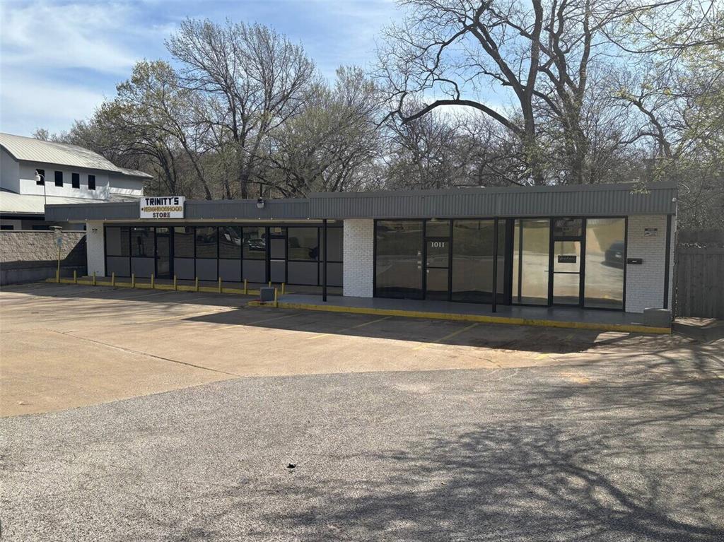 Presenting an exceptional investment opportunity in the heart of Arlington!

This property boasts a spacious 3,800 SF building with three units. Originally constructed in 1973 and currently zoned CC, this expansive space offers a blank canvas with significant potential for redevelopment. The versatile layout is ideal for transformation into a live music venue, a trendy cigar saloon, a restaurant, an art studio, or a storage hub. With its blank canvas appeal, customization is limited only by your vision. Ample parking and easy access to major roadways enhance its appeal. The strategic location in the thriving Arlington area ensures high visibility and accessibility, a crucial advantage for attracting and retaining tenants.

Don't miss out on this chance to enhance your commercial real estate portfolio with a property poised for substantial growth and success