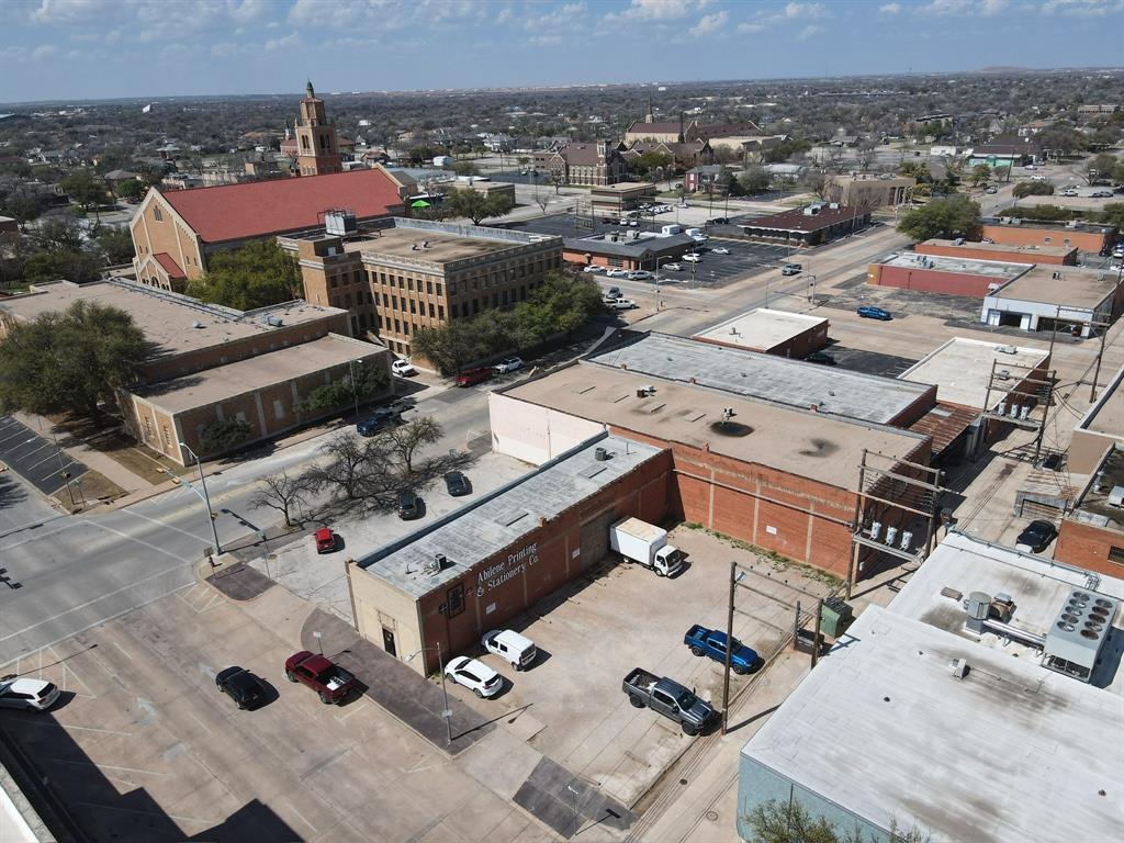 Own a piece of Abilene history in the heart of downtown! The former home of Abilene Printing & Stationary, the oldest business in Abilene, Texas! This sale includes three total parcels including a parking lot with approximately 16 spaces. Located at a very busy intersection between the Abilene Public Library and First Baptist Church. The two buildings include approximately 9,500 sqft, and the parking lot is an additional 6,000 sqft according to the central appraisal district. This property is zoned CB making it probable to convert into just about any kind of business or re-purposed for multi-use. 1274 N 2nd is single story featuring approximately 2,500 sqft, and 241 Hickory is two story featuring approximately 7,000 sqft. The possibilities here are endless! Bring your ideas and add to the rich history of this historical property!