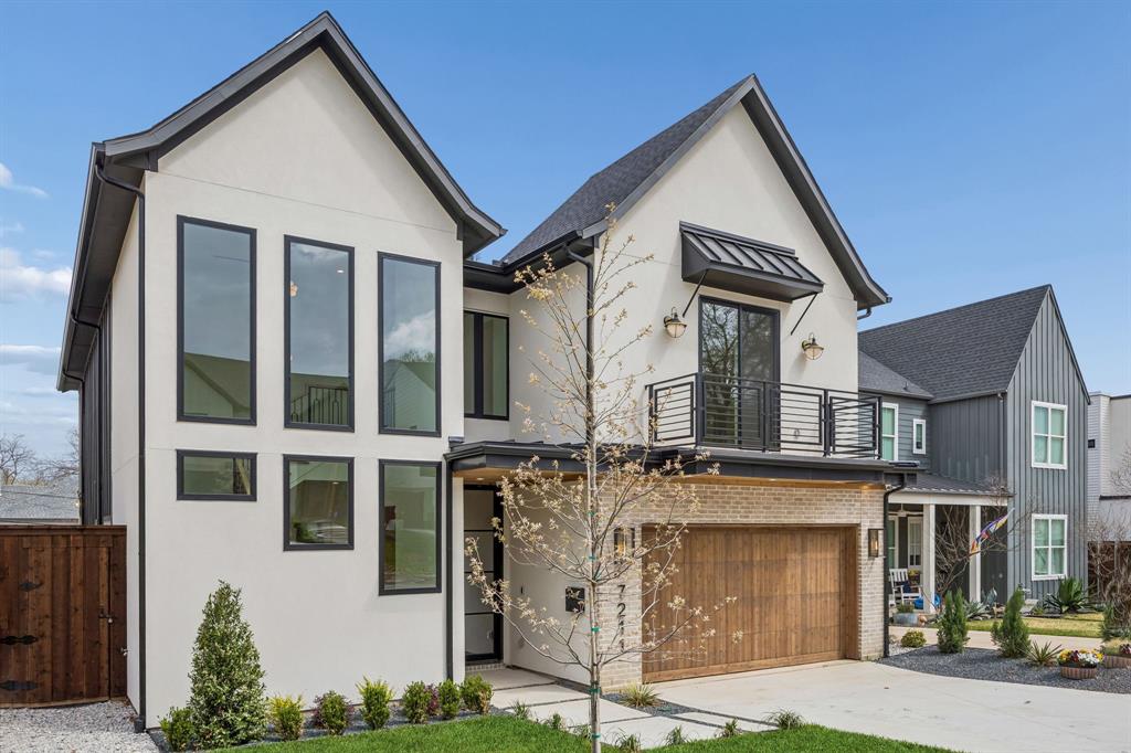 Located on the coveted “C Streets” and within the highly sought-after Lakewood Elementary School attendance zone, this exceptional new construction delivers nearly 4,700 sqft of refined modern luxury just minutes from White Rock Lake, Lakewood Village, and Dallas’ premier dining and retail. Thoughtfully designed for elevated living and effortless entertaining, this 5-bedroom, 5.2-bath home showcases soaring ceilings, 5-inch white oak hardwoods, and a seamless open-concept layout flooded with natural light. The chef’s kitchen is a true centerpiece with hand-built custom cabinetry, Taj Mahal granite counters and backsplash, WOLF® dual-fuel range, premium appliances, oversized walk-in pantry, and a fully equipped hidden prep-back kitchen—perfect for caterers or the avid home chef. Expansive walls of glass overlook a pool-sized backyard and create exceptional indoor-outdoor flow to the covered patio and built-in outdoor kitchen. The downstairs primary suite offers a spa-inspired bath with oversized rainfall shower and custom walk-in closet, while the first floor also includes a private study, guest suite, and full laundry room. Upstairs features three ensuite bedrooms, spacious game-media room, secondary laundry, and a large covered balcony ideal for sunset views. Built with today’s buyer in mind, the home also includes smart-home wiring, CAT-6E prewiring, foam insulation, dual tankless water heaters, and a builder’s warranty. A rare opportunity to own a luxury new construction in one of East Dallas’ most prestigious and tightly held neighborhoods.